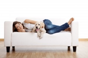 upholstery cleaning for Santa Rosa, Petaluma - woman and dog on couch