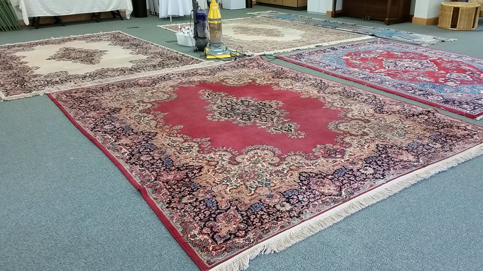 we clean area rugs in your home or drop them off